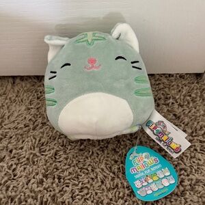 Flipamallow Green Cat to leopard squushmallow